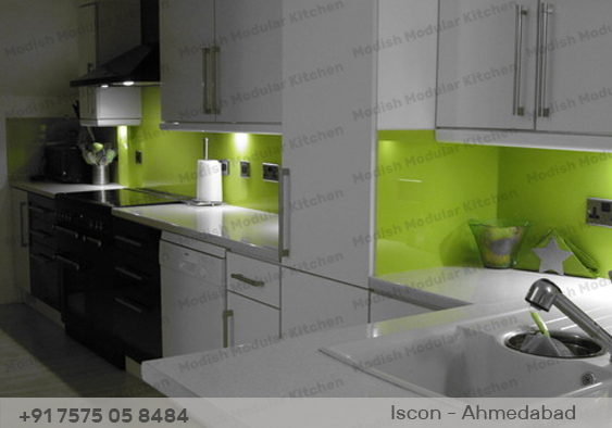 BACK PAINTED GLASS MODULAR KITCHEN IN AHMEDABAD